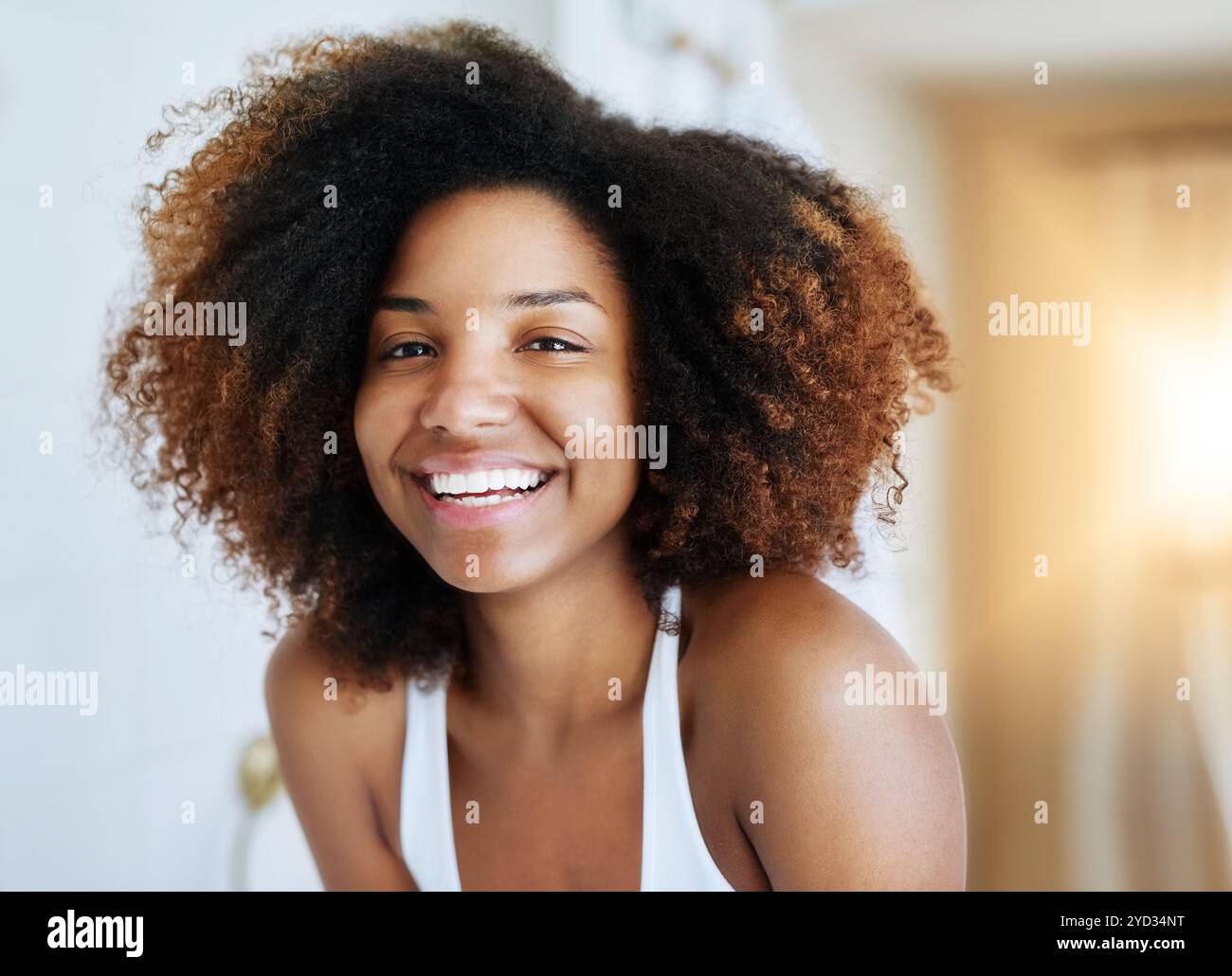 Haircare, afro and black woman with smile, healthy and happy with ...