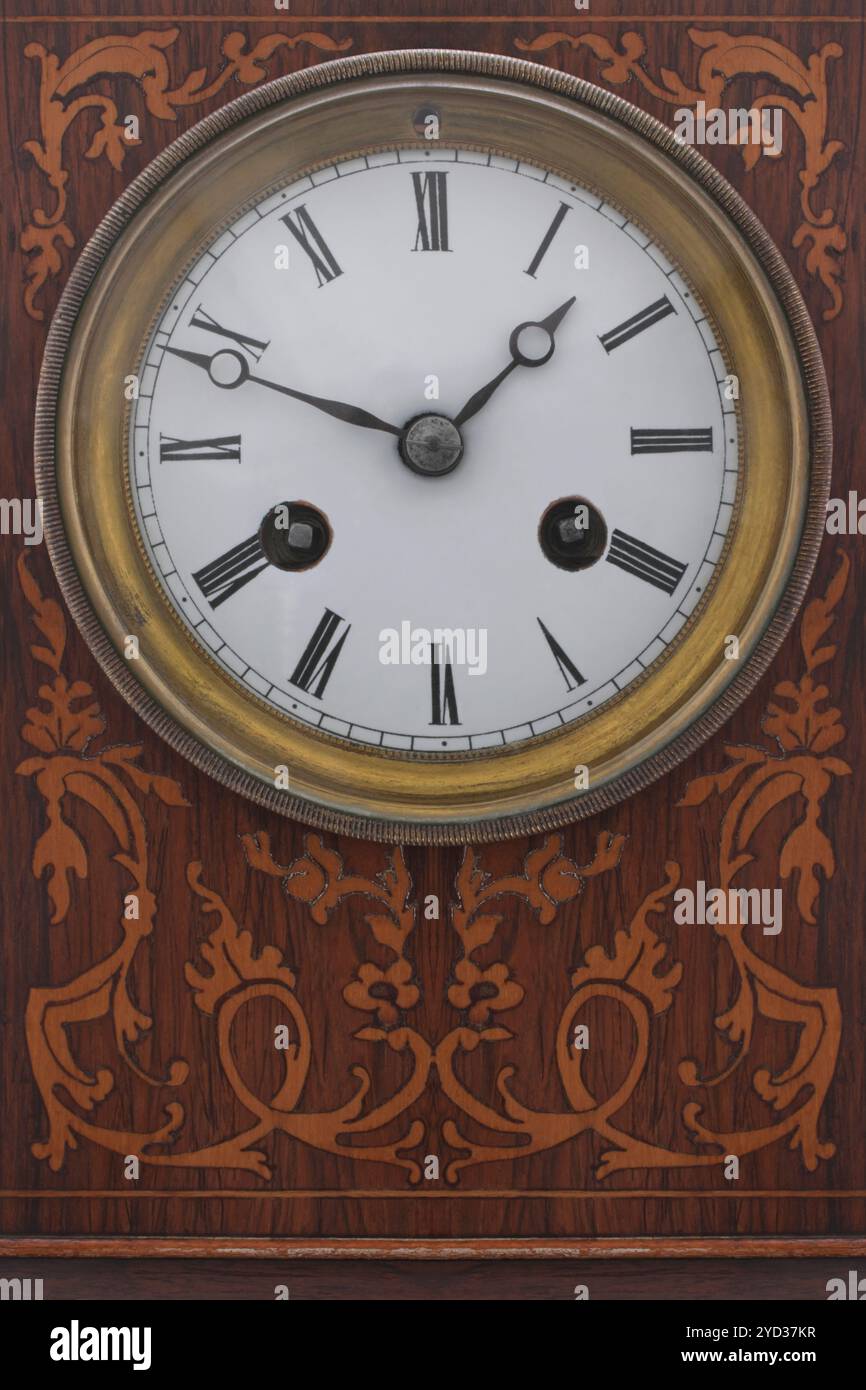 Antique carriage clock on white background Stock Photo