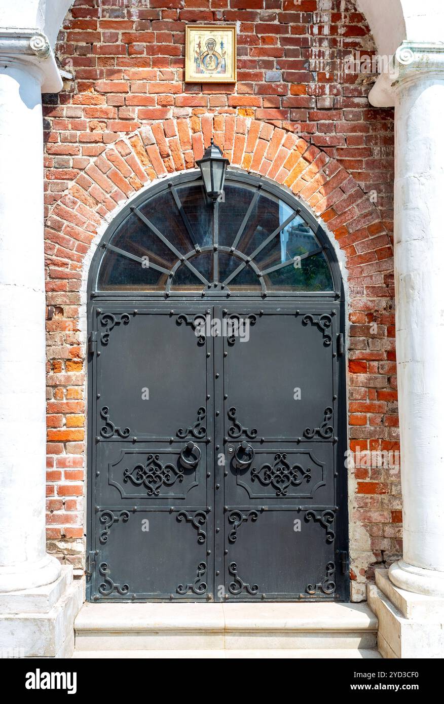 Old cathedral forged metal gate Stock Photo