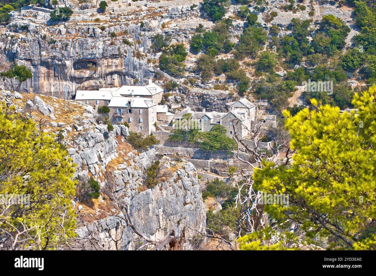 Pustinja Blaca hermitage hidden in stone desert canyon of Brac island Stock Photo