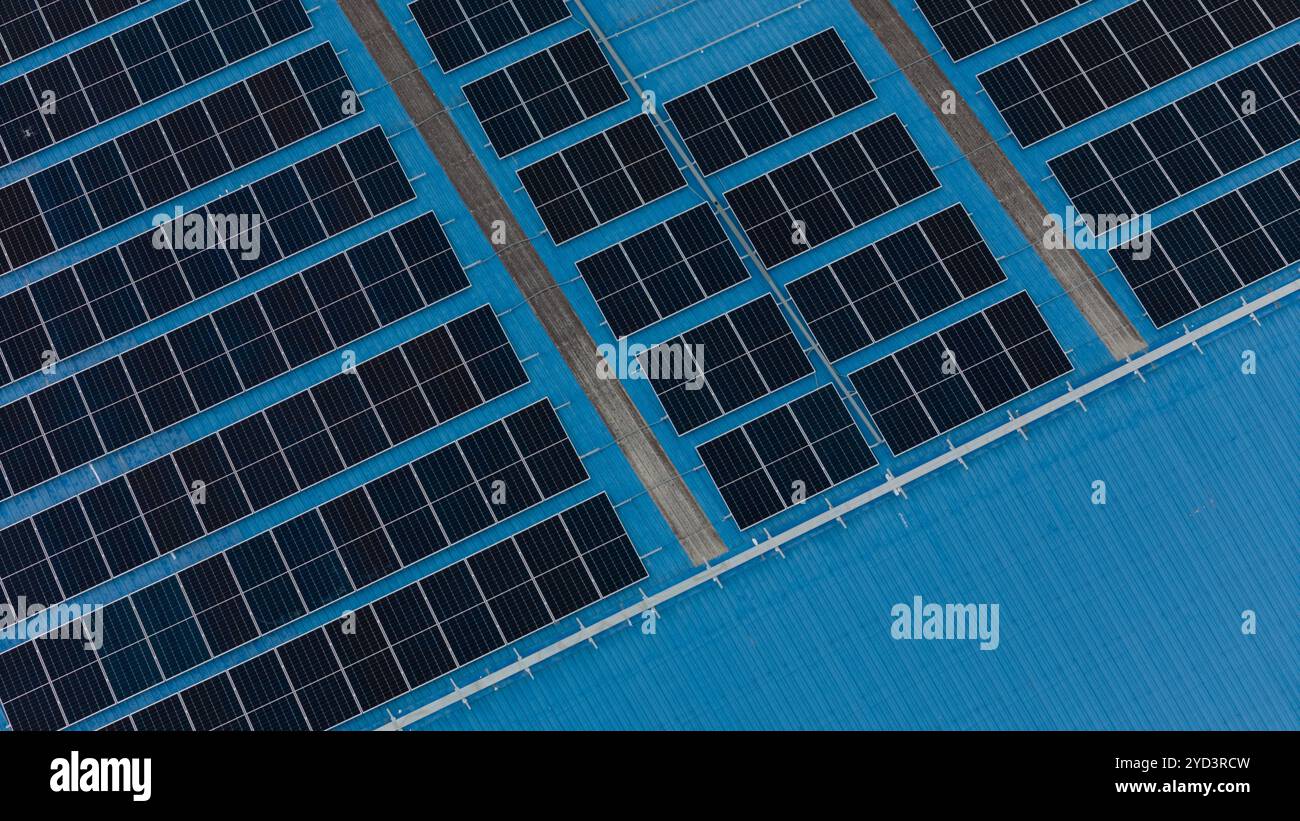 Solar Panel. Solar photovoltaic panel system in Industry roof. Saving Energy with Clean Power. Stock Photo