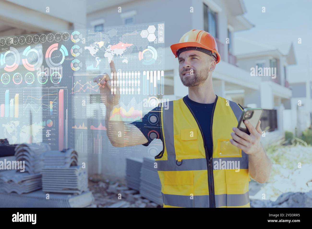Engineer builder worker using advance technology digital hologram infographics touch panel in housing construction industry. Stock Photo
