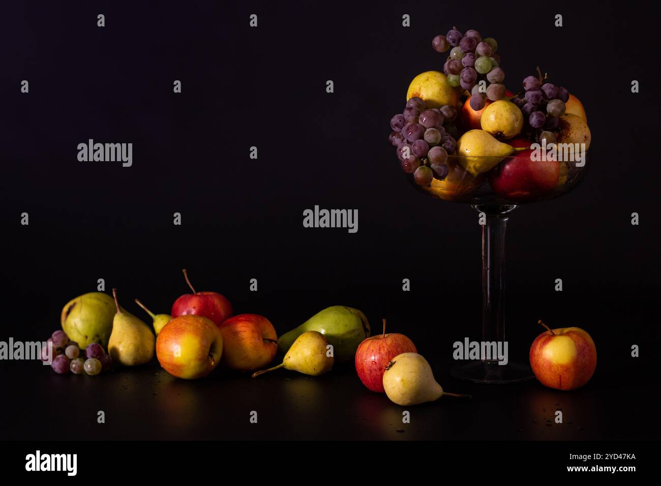 Still life of fruits on a black background, autumn harvest, than Stock ...