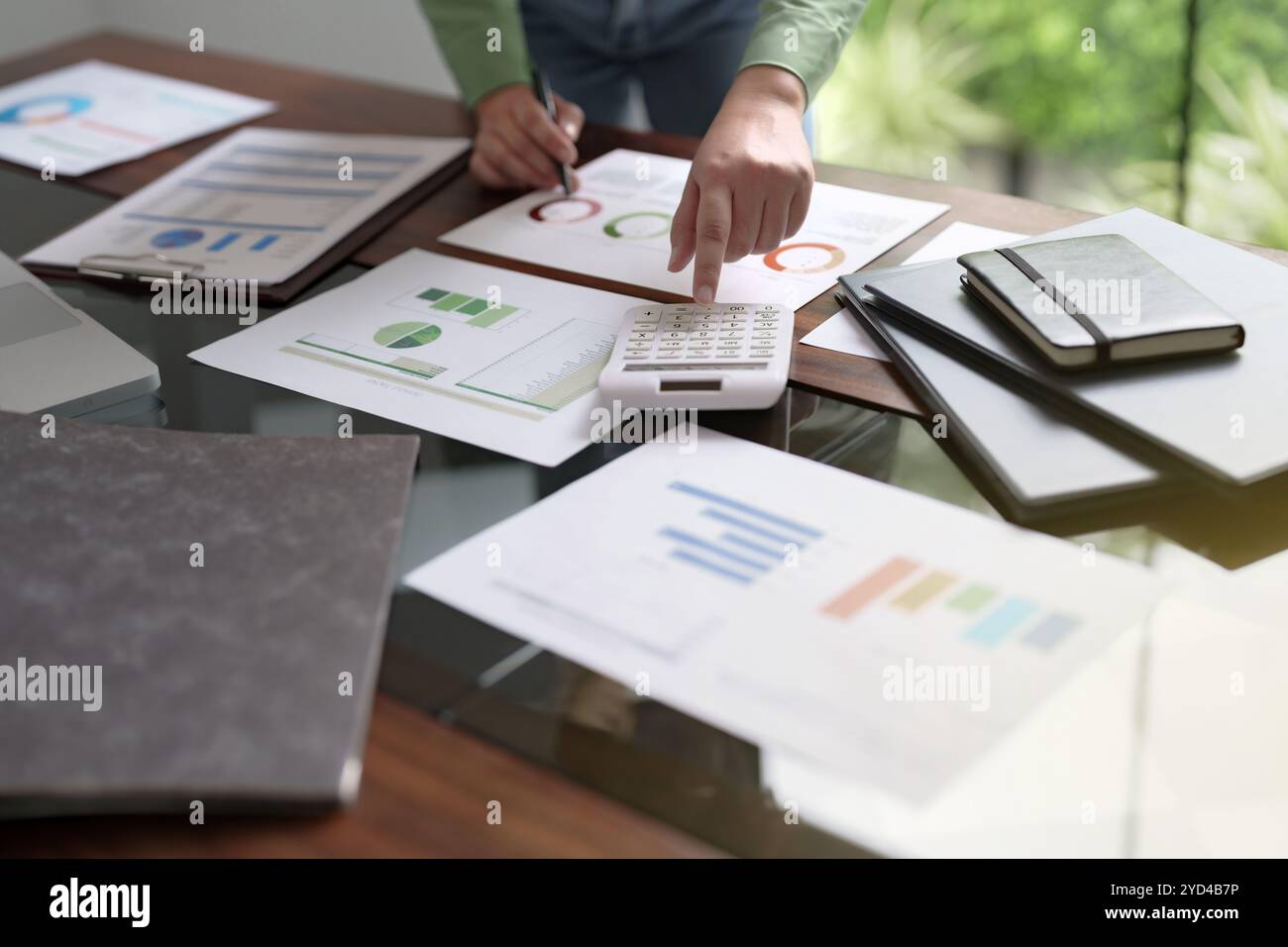 Close up Millennial confident Female working in creative office. Stock Photo