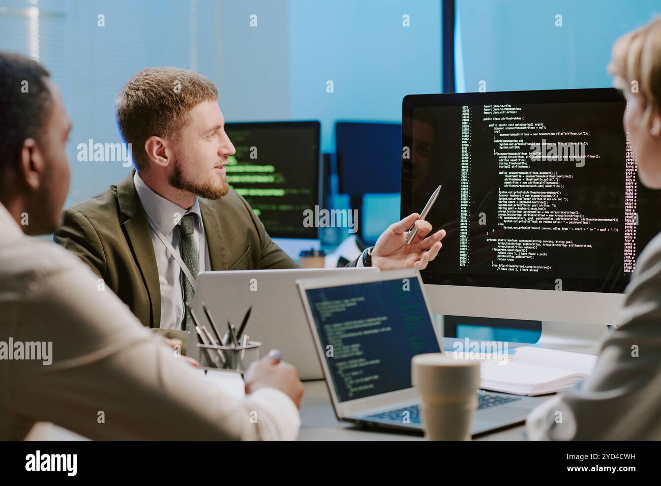 Cybersecurity Specialists Working in Team Stock Photo