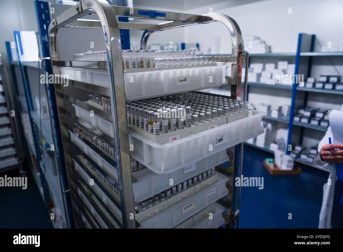 Medical analysis laboratory. Blood sample racks in positive cold room ...