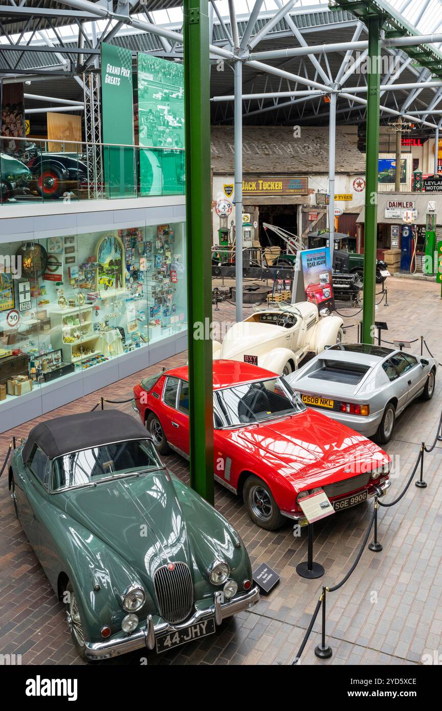 Beaulieu National Motor Museum showing an Auburn 851 Speedster,Lotus Esprit,Jenson Interceptor, and a Jaguar XK120 in the Main Hall Beaulieu Hampshire Stock Photo