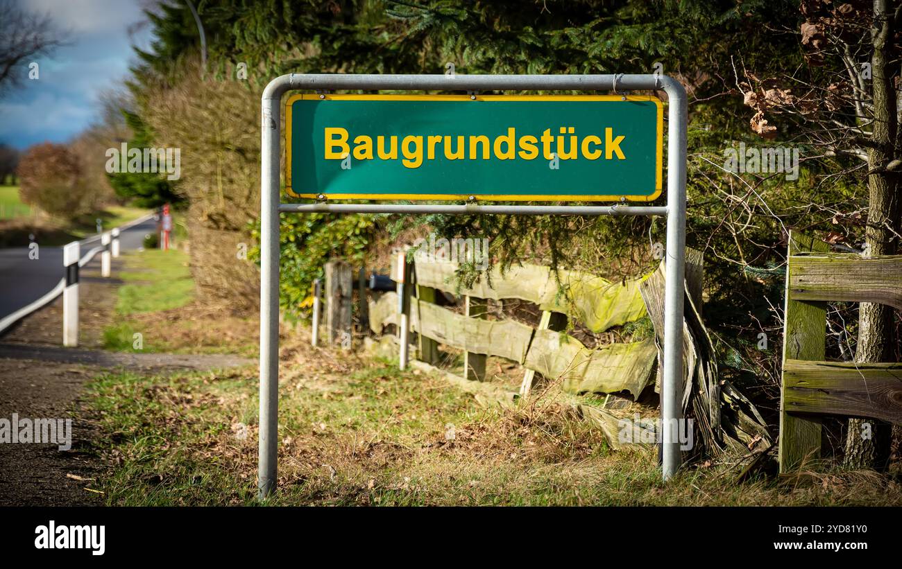 Construction Plot Sign Signposts the direct way to building plot - BILDMONTAGE Stock Photo - Alamy