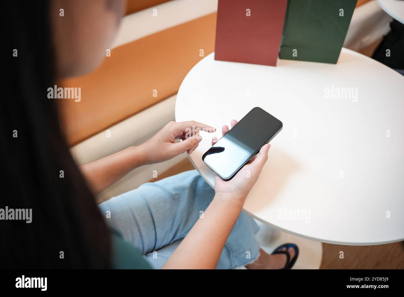 Asian woman using smartphoneÂ mobile addict spending time checking news social media cell telephone technology e-commerce concep Stock Photo