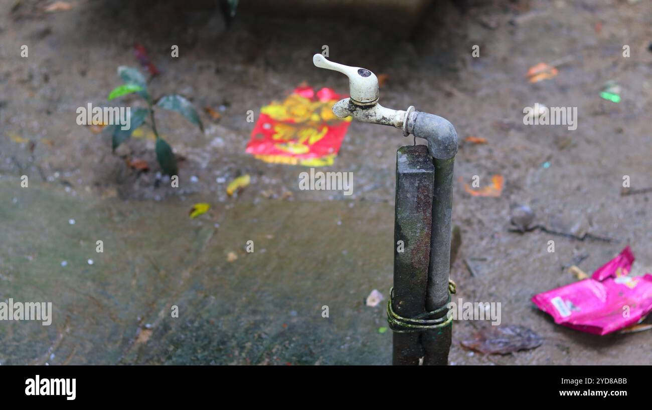 Water Tap Rual Old Outdoor Water Tap In A Rural Muddy Environment Stock Photo - Alamy