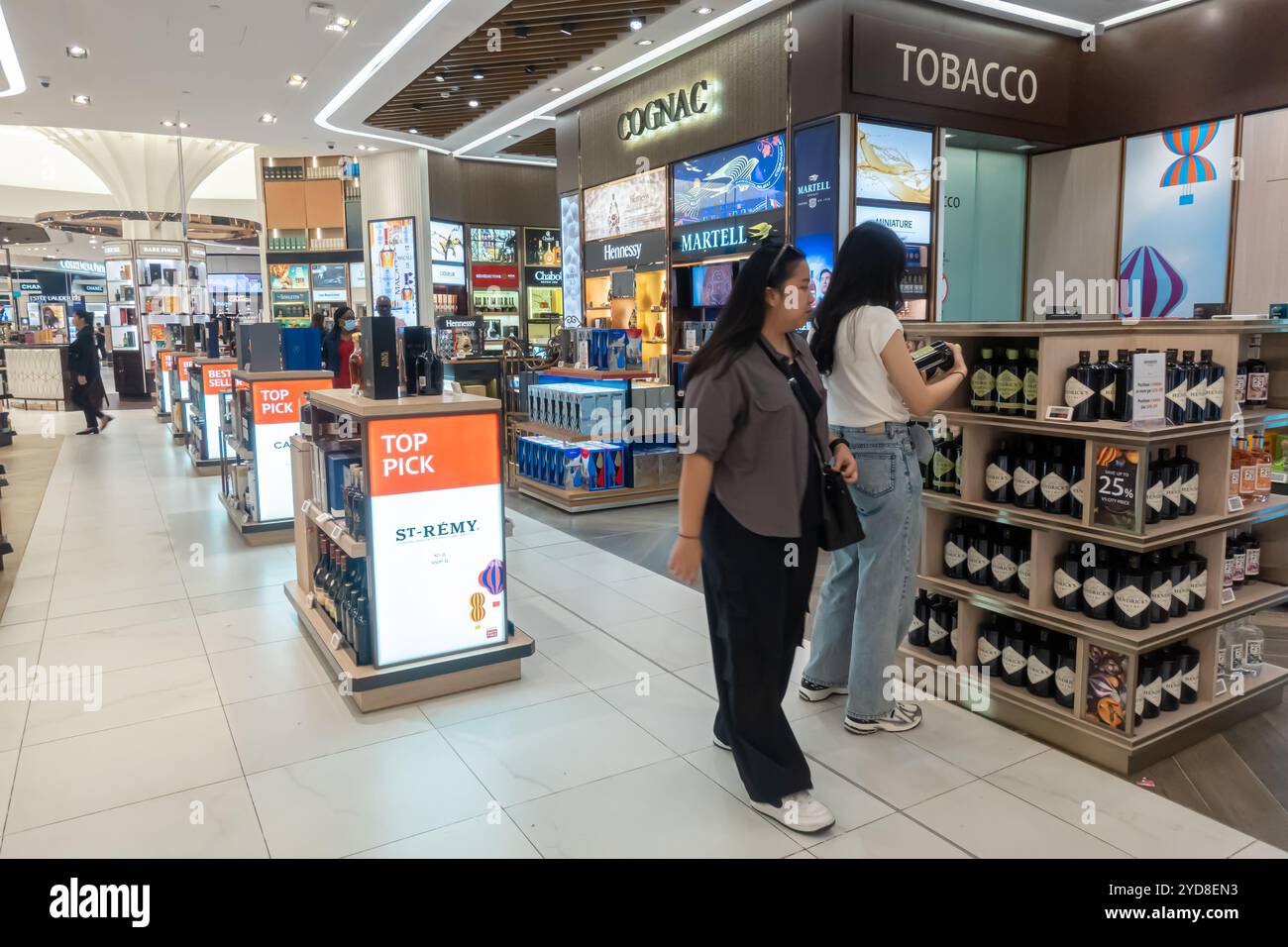 Singapore Changi Airport Terminal 4 duty free shop women buying
