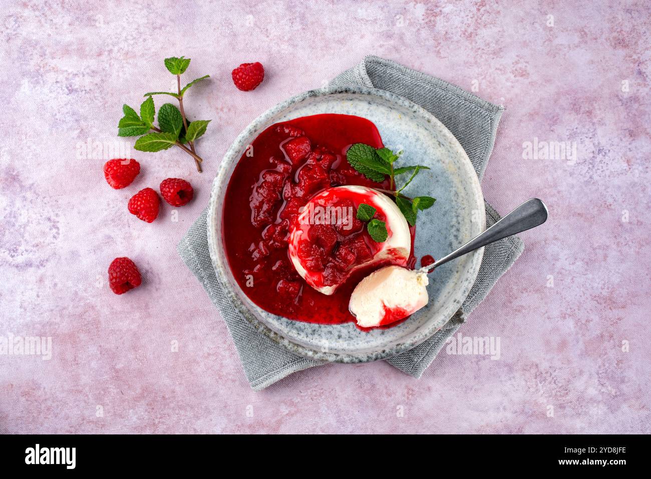 Traditional quark mousse with rhubarb and raspberry compote served as ...