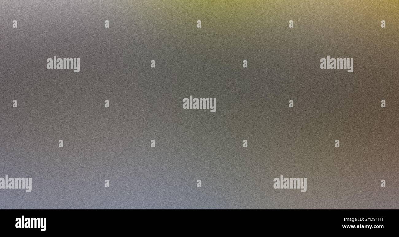 Grainy gradient background fading from grey to yellow Stock Photo