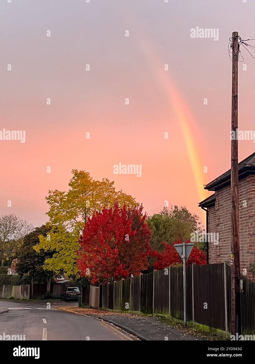 Kent, UK. 21st October 2024. Double rainbow appeared in the sky viewed from Sevenoaks, facing east in a residential road. England UK - Smartphone Captured Stock Image