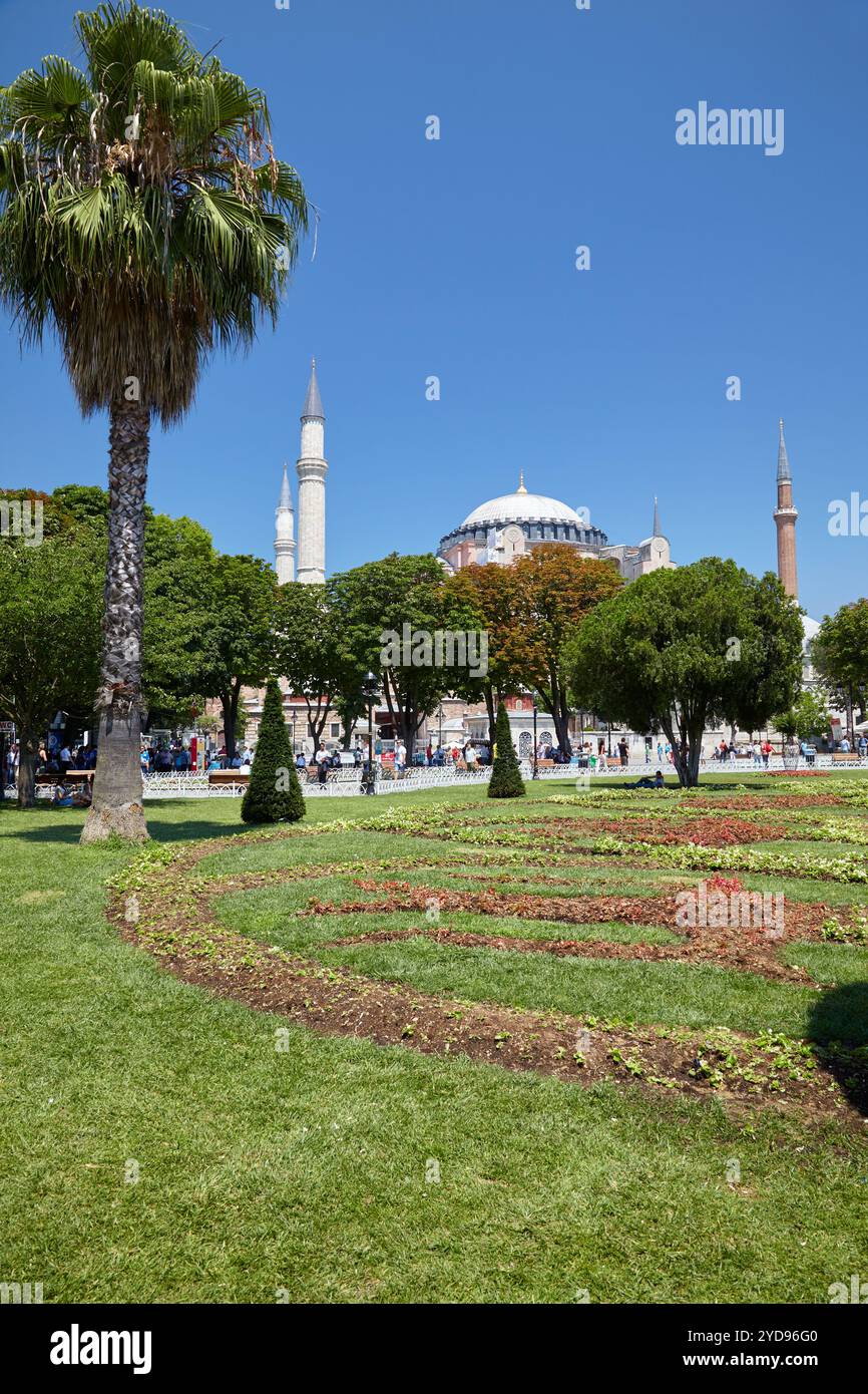 View of Hagia Sophia through the lawns and the trees of Sultan Ahmet ...