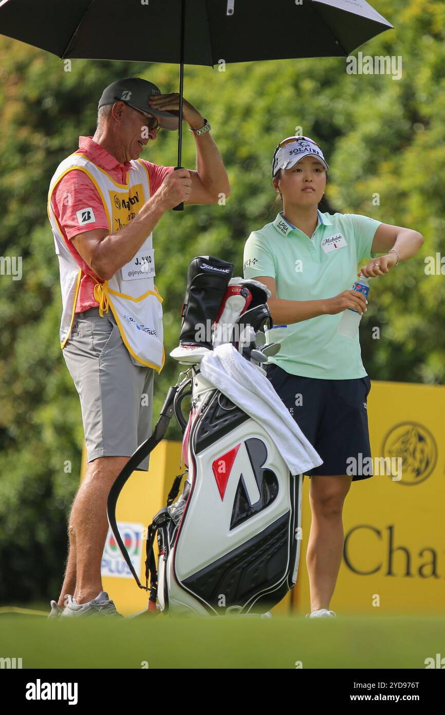 Jin Young Ko of Korea seen with her caddie walks to the 3rd tee during