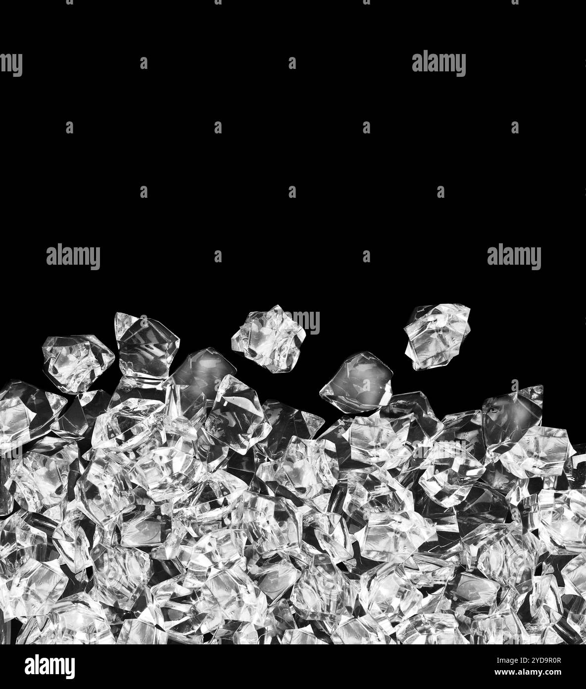 Ice cubes isolated on black background Stock Photo - Alamy