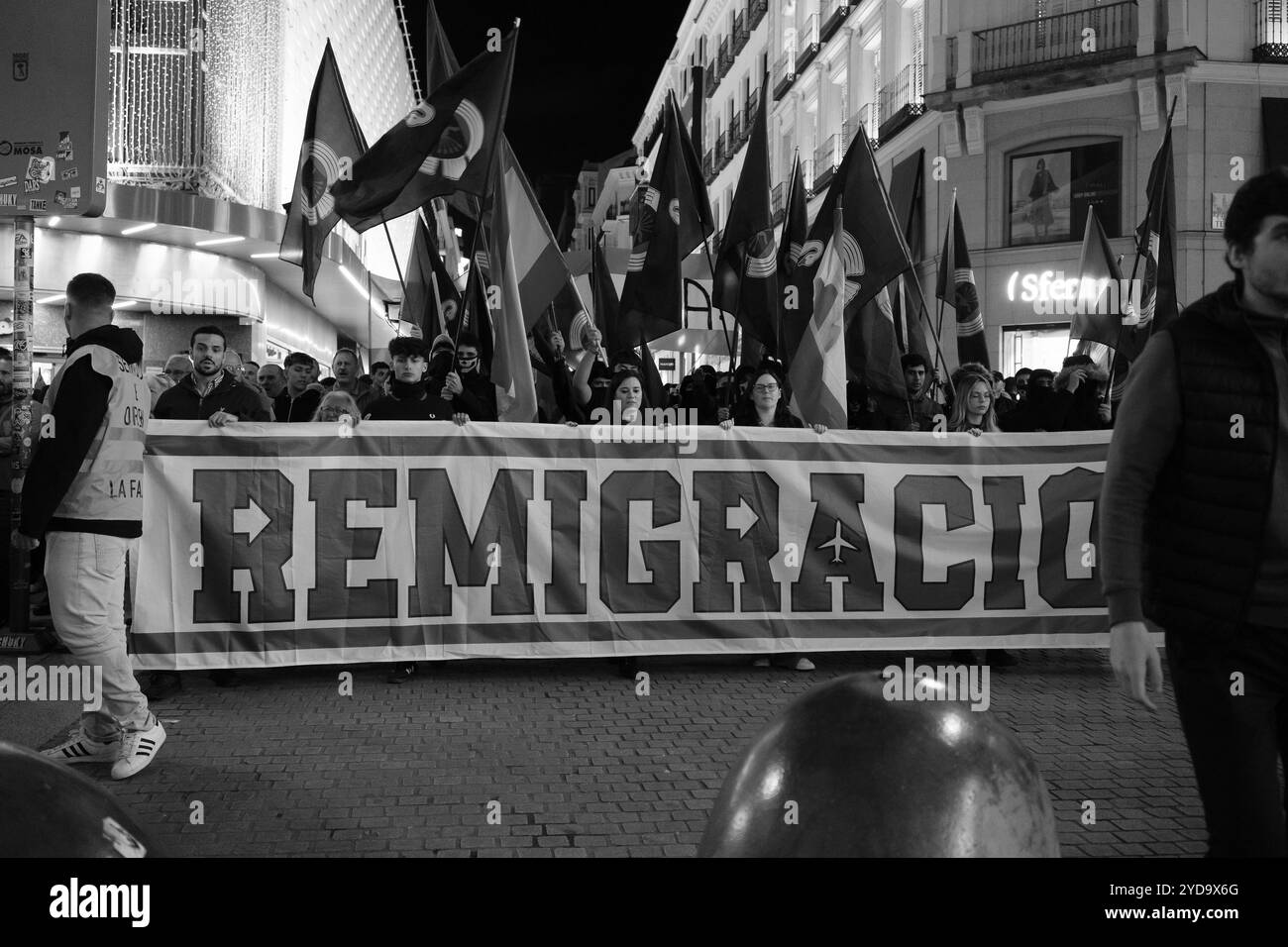 Several people during a demonstration of the Spanish Falange against the regime of '78 in the center of Madrid, on October 25, 2024, in Madrid, Spain. Stock Photo