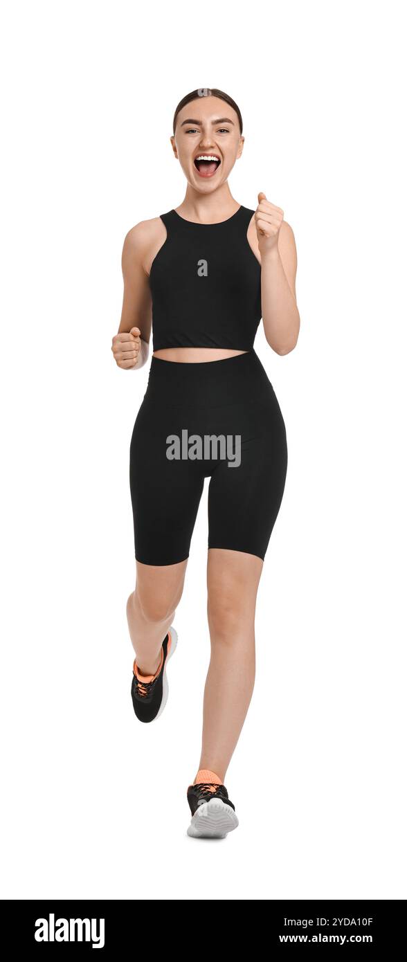 Beautiful woman in sportswear running on white background Stock Photo ...