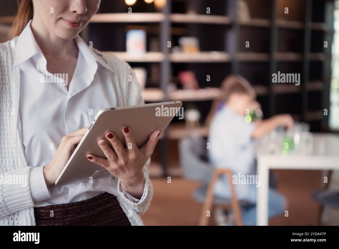 Science classroom teacher review lesson plans before teaching students ...