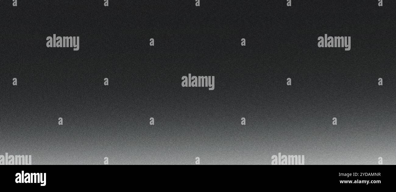 Grainy textured background featuring a gradient from black to white, offering ample copy space Stock Photo