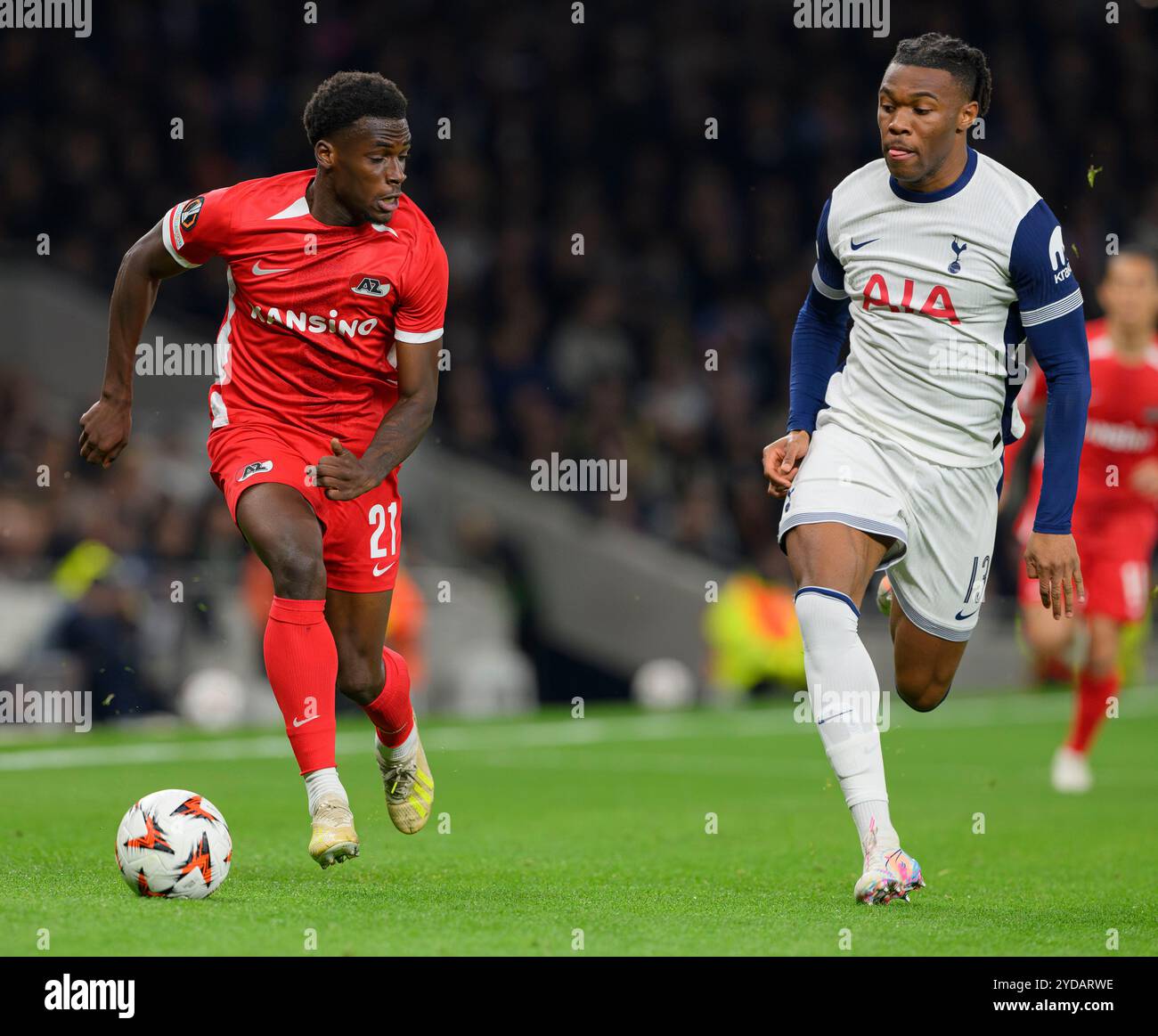 London, UK. 19th Oct, 2024. London, England - October 24: AZ Ernest Poku (left) under pressure from Tottenham Hotspur's Destiny Udogie (right) during the UEFA Europa League 2024/25 match between Tottenham Hotspur v AZ Alkmaar at Tottenham Hotspur Stadium on October 24, 2024 in London, England. (David Horton/SPP) Credit: SPP Sport Press Photo. /Alamy Live News Stock Photo