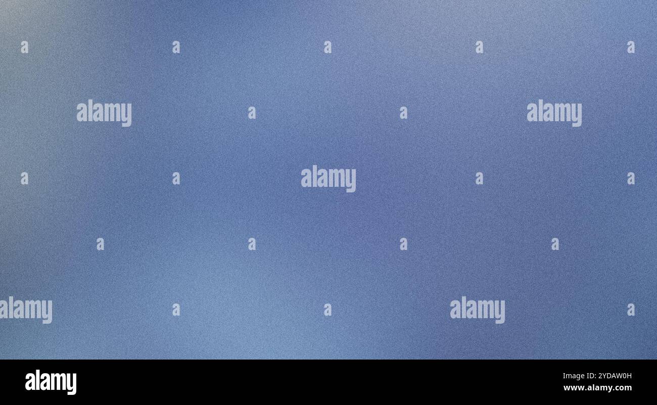 Subtle gradient effect created by grainy texture on a blue background Stock Photo