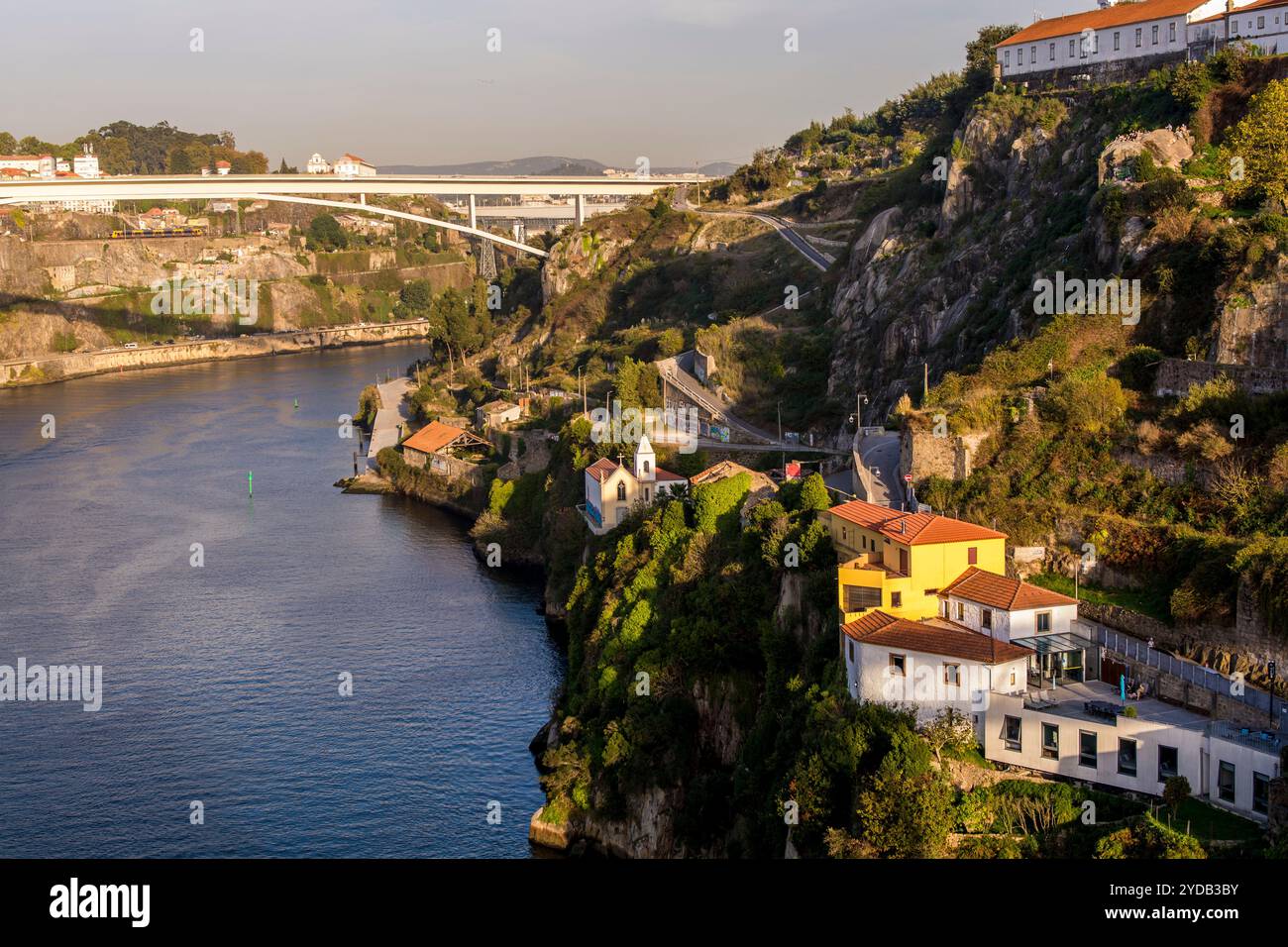 Capela do senhor de alem (Chapel of the Lord of Beyond) and infante bridge, vila nova de gaia, porto, portugal. Stock Photo