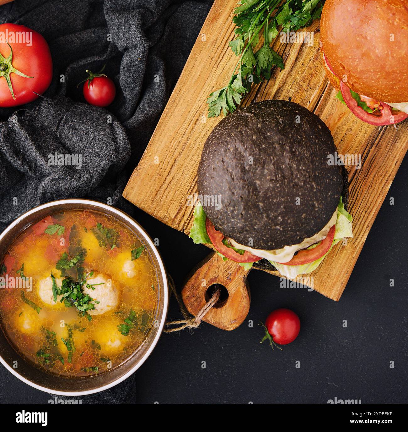 Picture concept for food delivery. Burgers in cardboard boxes Stock Photo