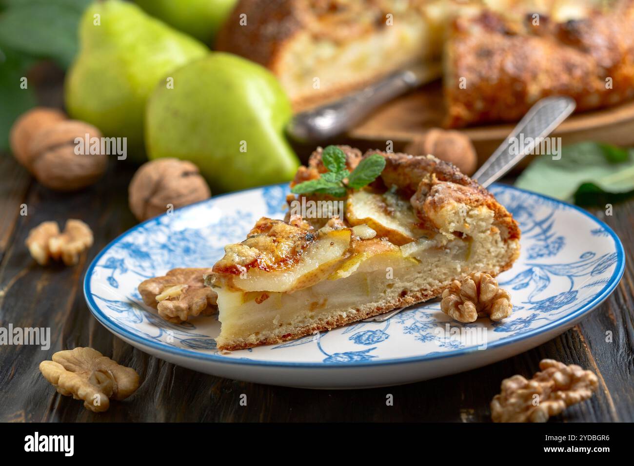 Piece of open pie (biscuits) with pears, blue cheese and walnuts Stock ...