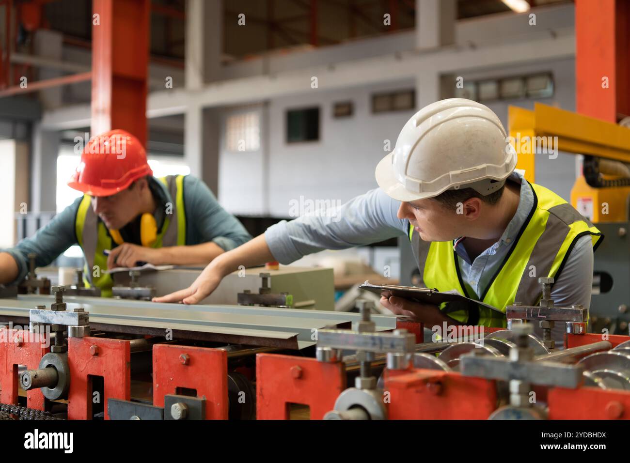 Worker operating testing machine hi-res stock photography and images ...