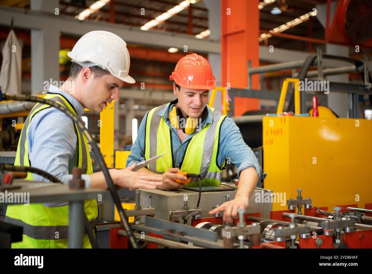 Two caucasian male production engineers hi-res stock photography and ...