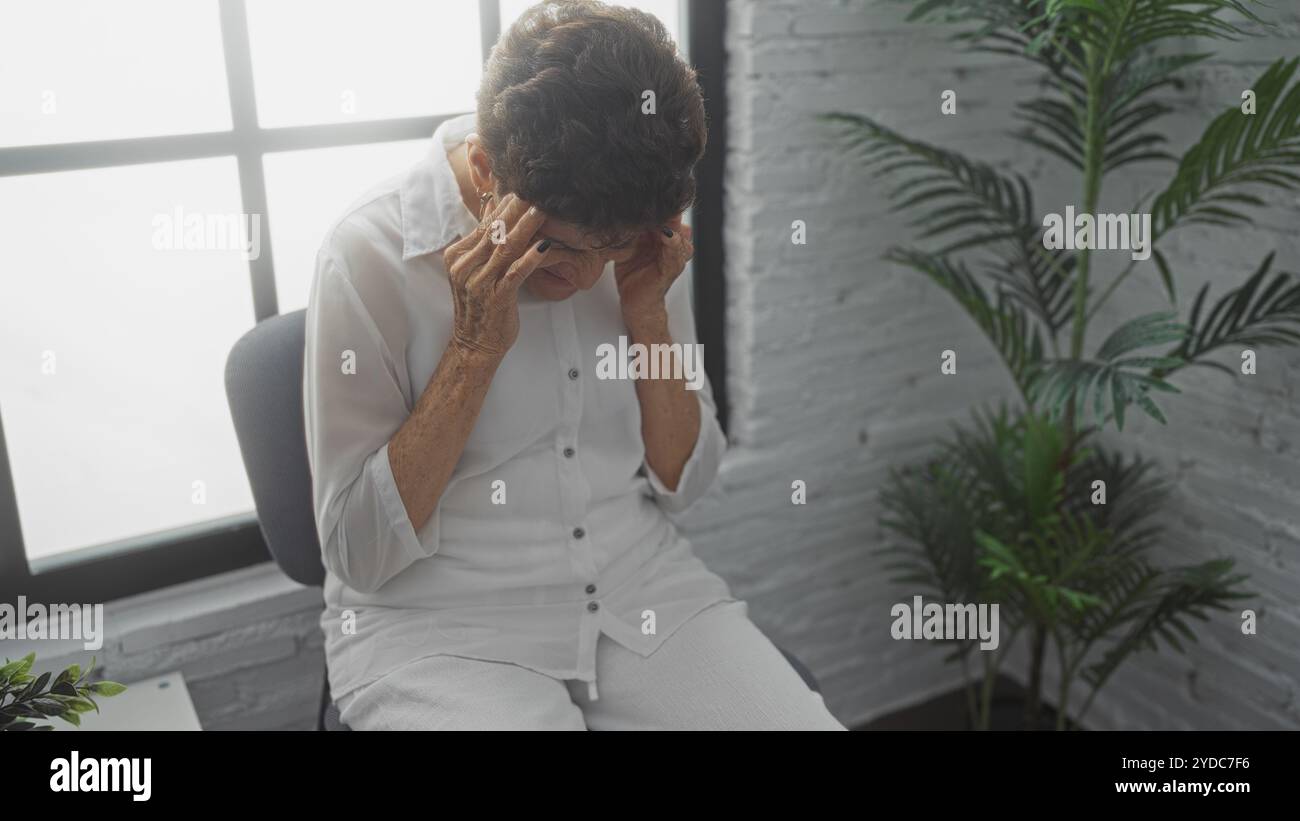 Woman white shirt holding temples hi-res stock photography and images ...