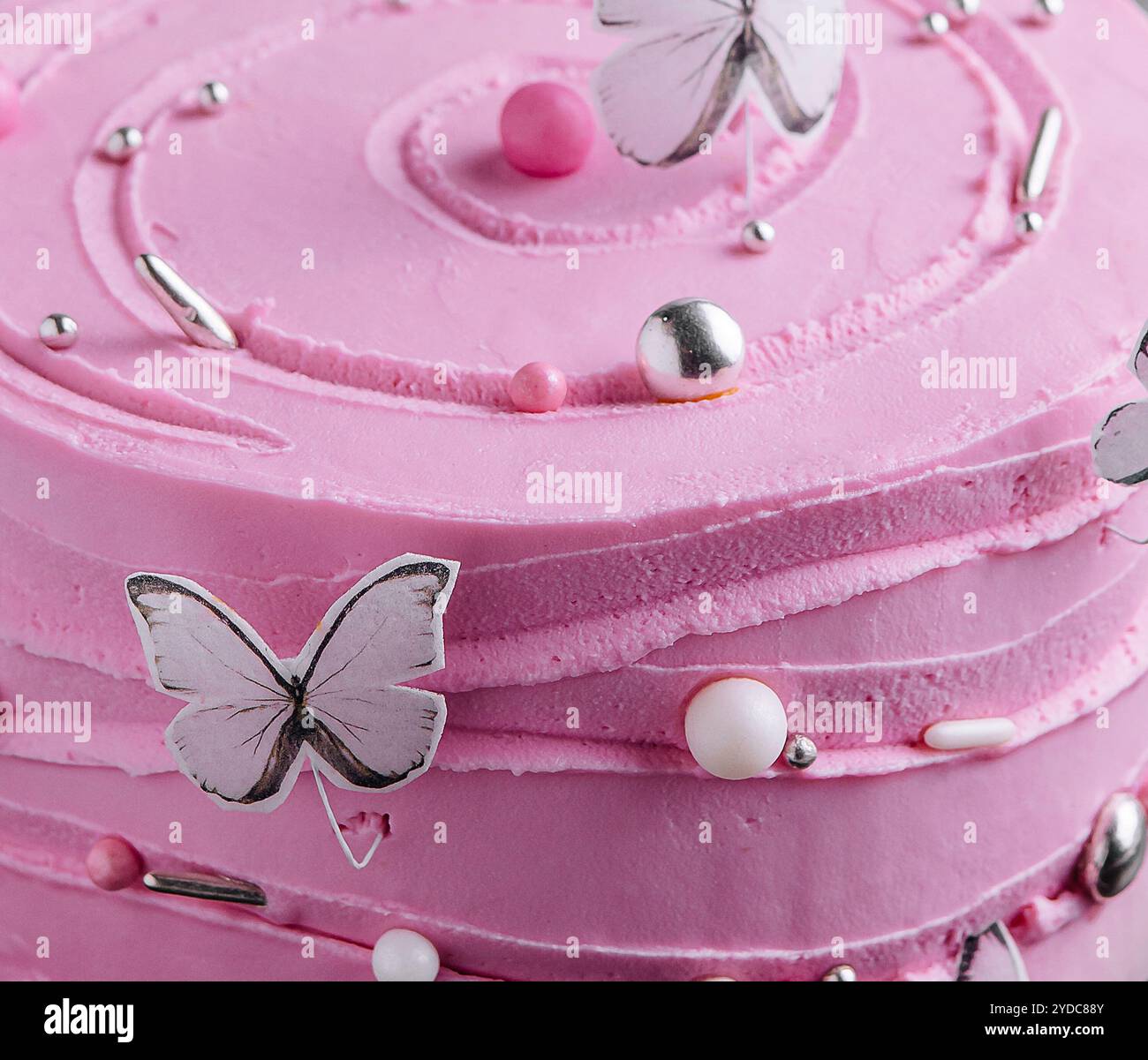Pink birthday cake flowers butterflies hi-res stock photography and ...