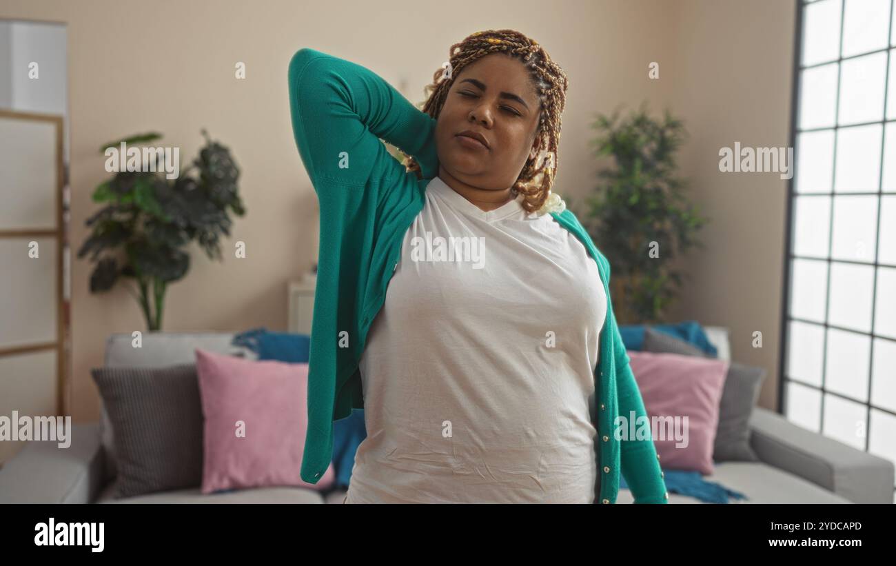 Woman beautiful braids stands hi-res stock photography and images - Alamy