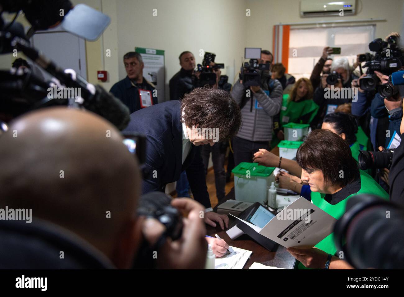 Tbilisi, Georgia. 26th Oct, 2024. Prime Minister Irakli Kobakhidze of the Georgian Dream registers to vote at a polling booth in Tbilisi. The Prime Minister of the Georgian Dream party places his vote at a polling booth in Tbilisi. Georgian Dream have been in power since 2012 and are looking for re-election, following backlash from the public surrounding their supposed pro-Russian stance. Many fear that if Georgian Dream win, Russia will have increased influence on the sovereignty of Georgia. Credit: SOPA Images Limited/Alamy Live News Stock Photo