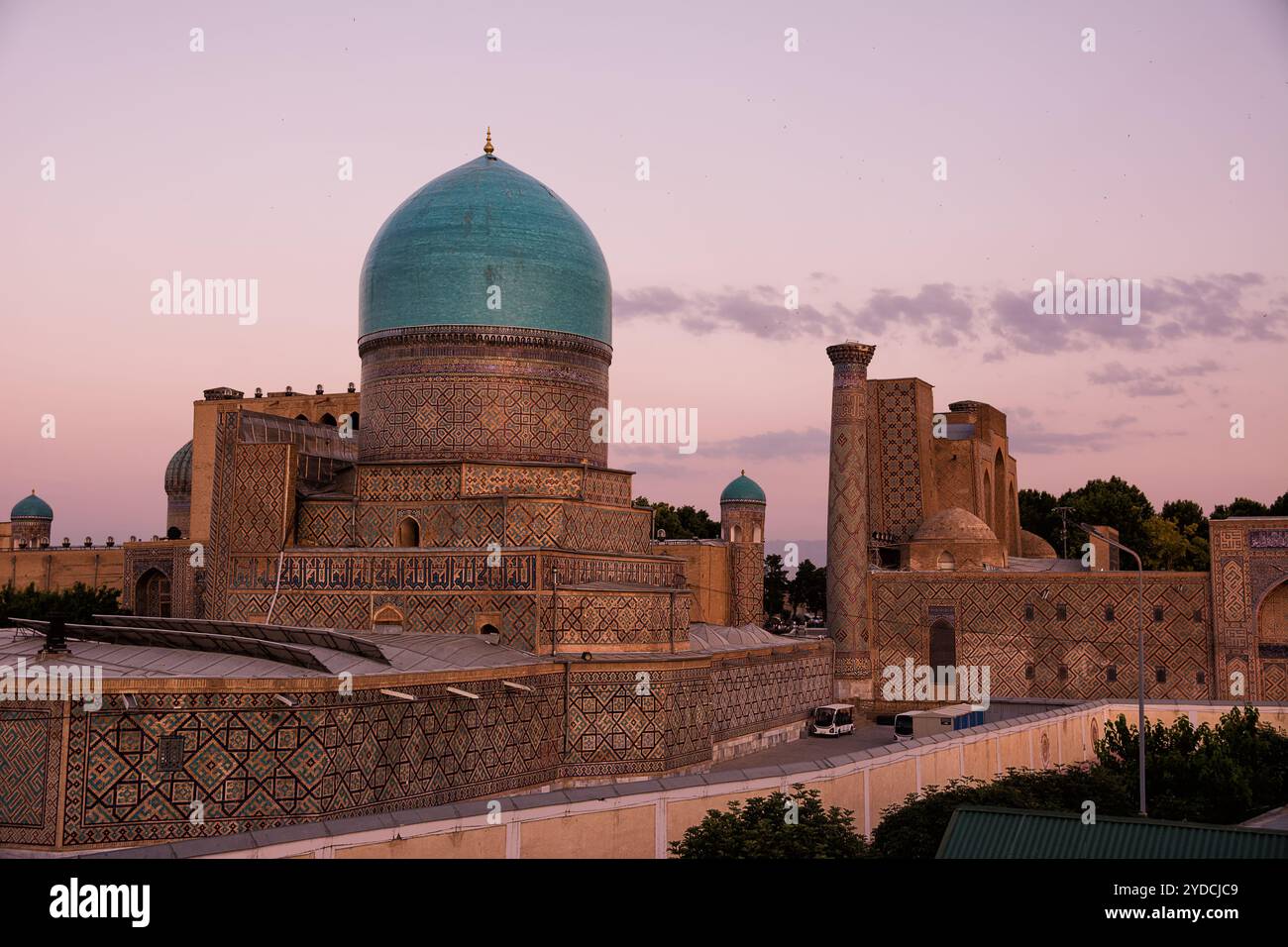 Samarkand, Uzbekistan - 05 July 2024: The dome of the Madrassa seen from outside the Registan square Stock Photo