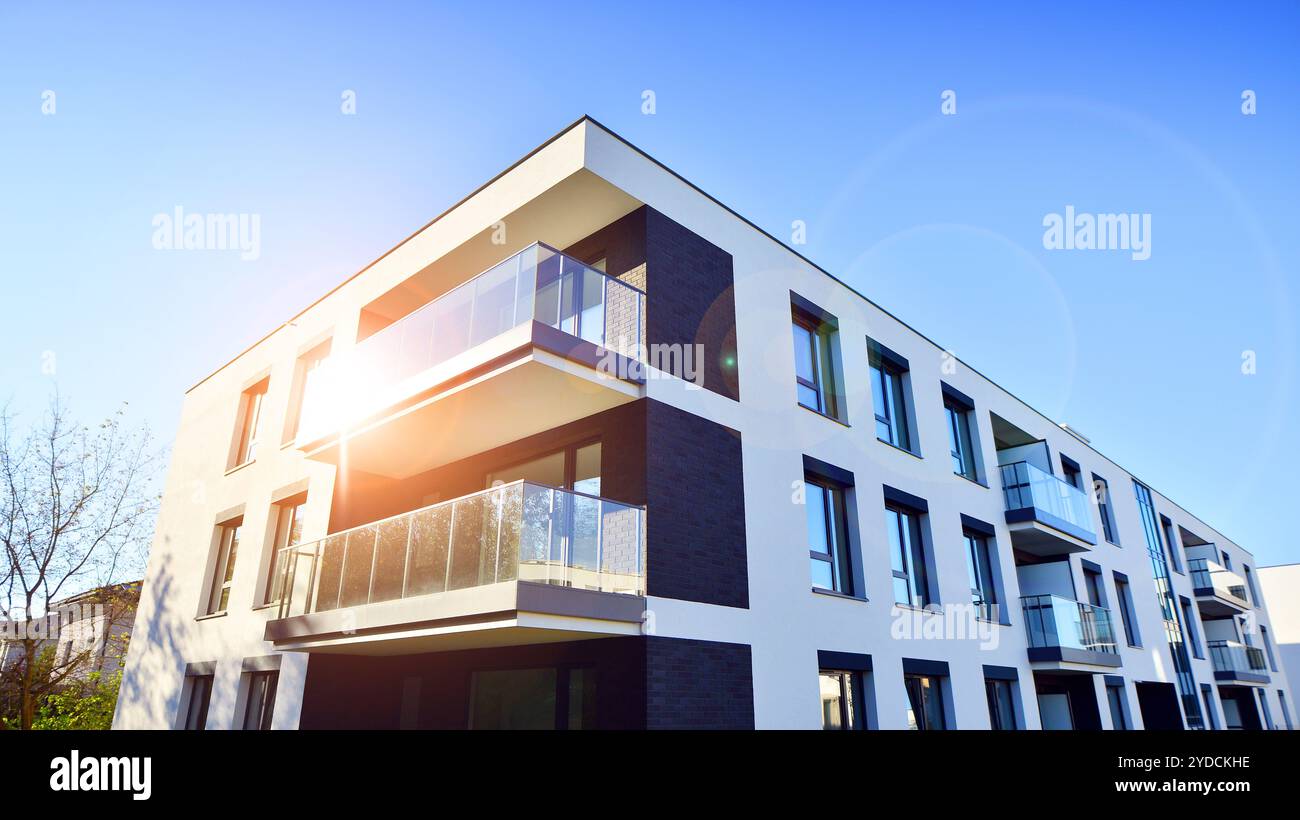 Image showcasing Modern multifamily building in a european city. Walls made of concrete ...