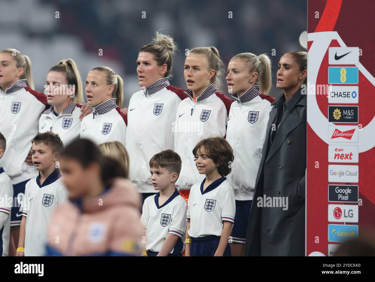 London, UK. 25th Oct, 2024. Former England player Steph Houghton (R) stands alongside the team for the national anthem ahead of the International Friendly match at Wembley Stadium, London. Picture credit should read: Paul Terry/Sportimage Credit: Sportimage Ltd/Alamy Live News Stock Photo