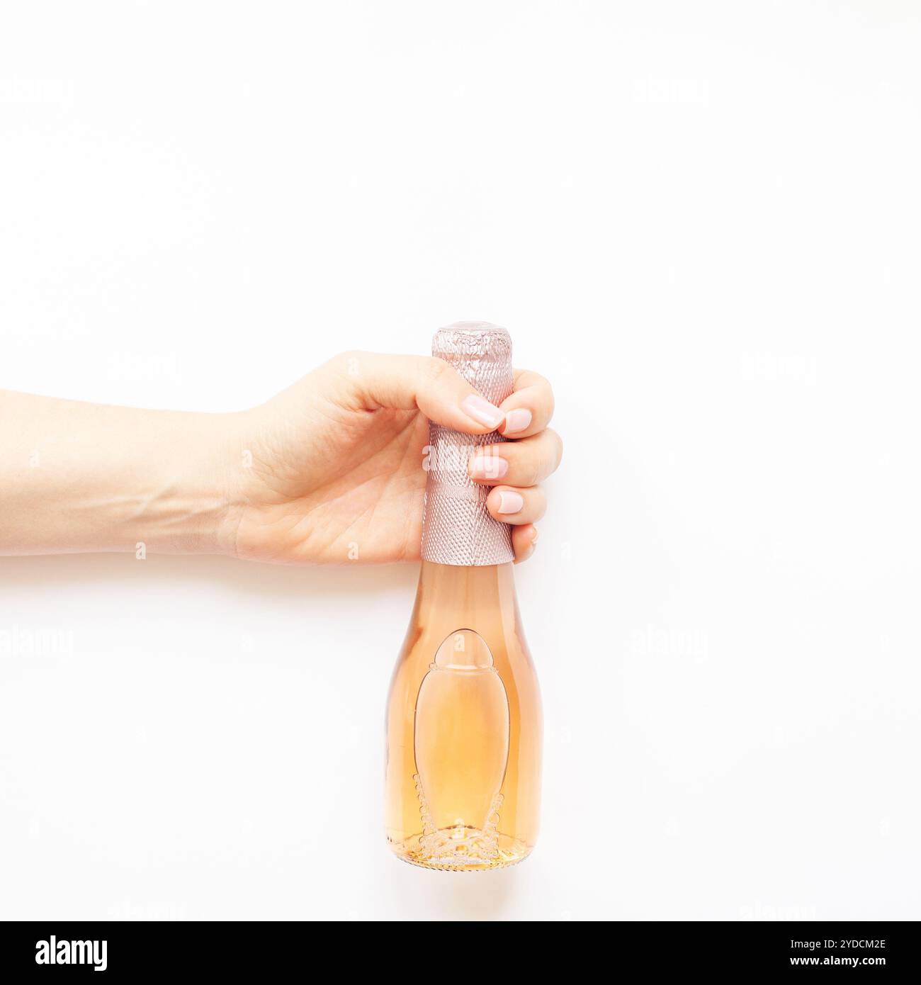 Champagne glass in female hand hi-res stock photography and images - Alamy
