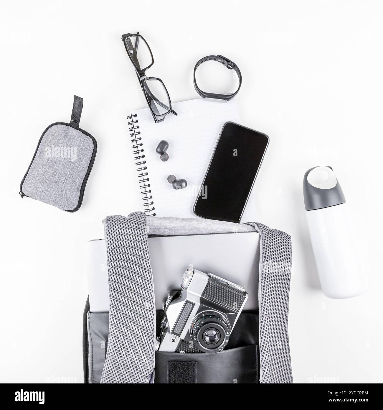 Modern backpack with laptop and tablet inside Stock Photo - Alamy