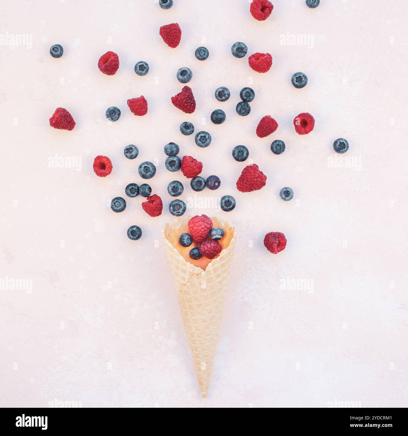 Summer composition berries ice cream waffle cone Stock Photo