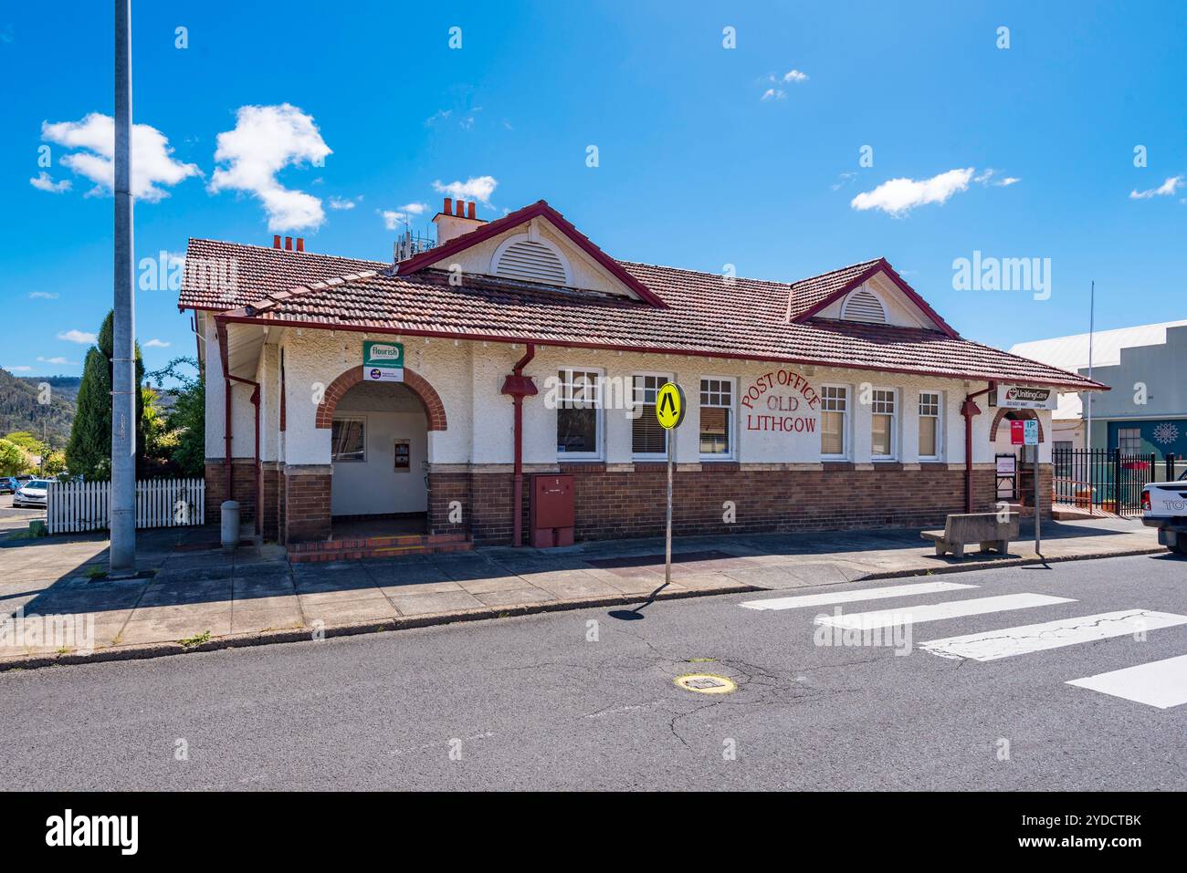 The 1925 constructed former Lithgow Post Office is a Californian Bungalow style building with double brick and rough cast render finishes Stock Photo