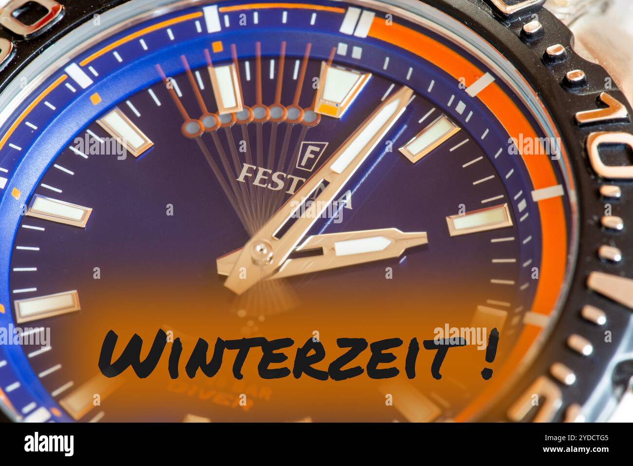 Symbol image time change, winter time: Close-up of a wristwatch with the inset lettering WINTERZEIT (Winter Time) Stock Photo