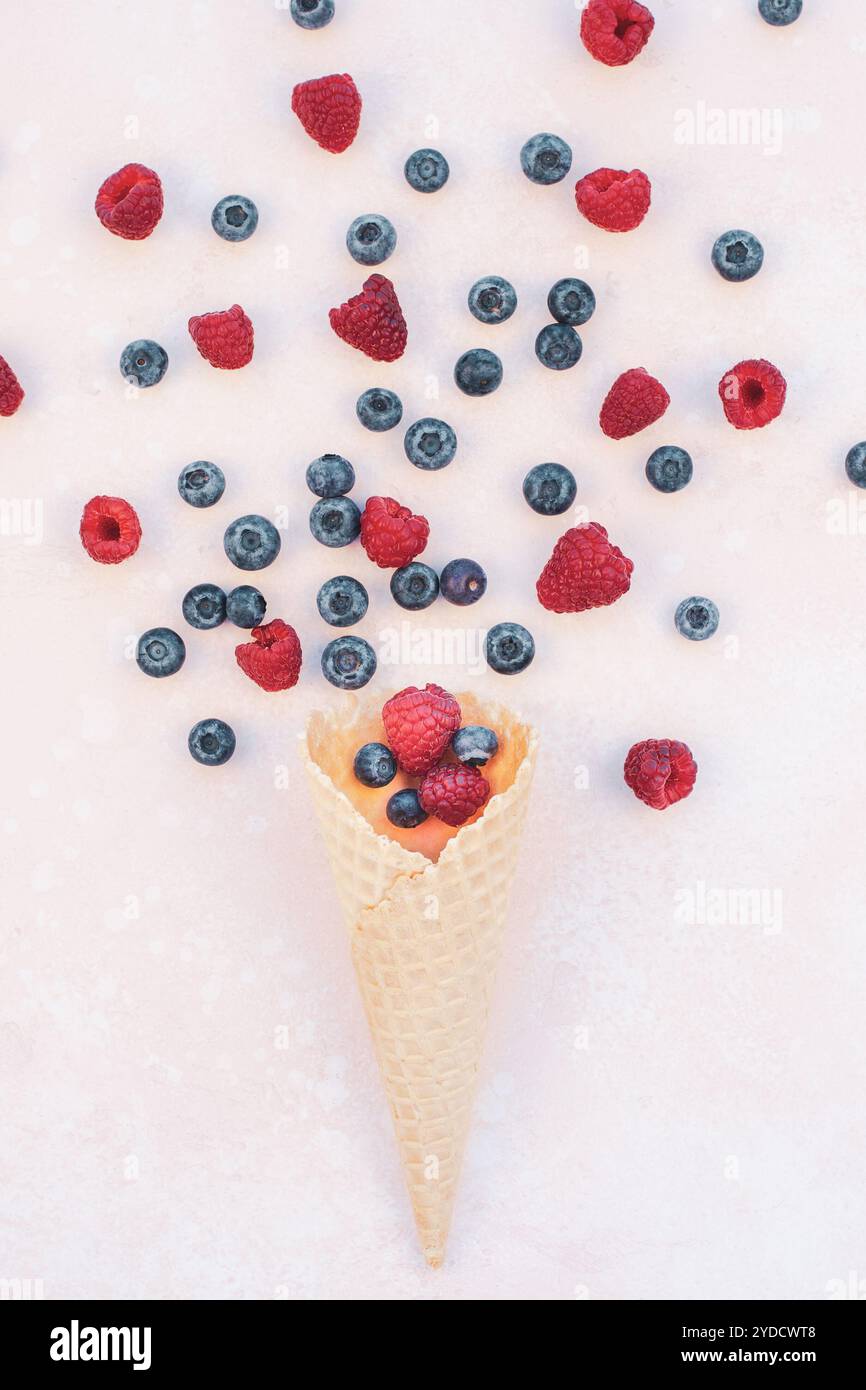 Summer composition berries ice cream waffle cone Stock Photo