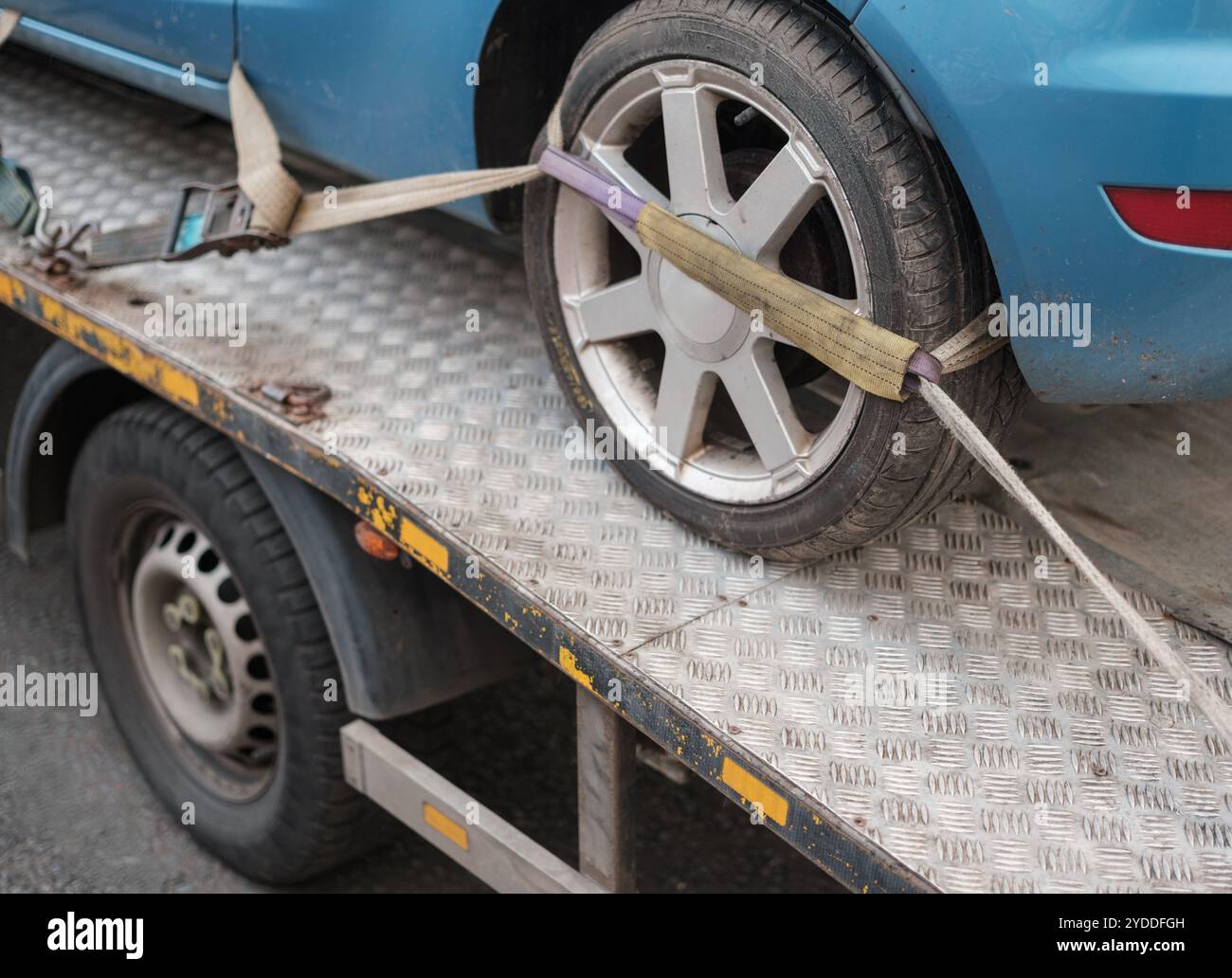 A Car Being Towed After A Parking Violation Or Breakdown Stock Photo