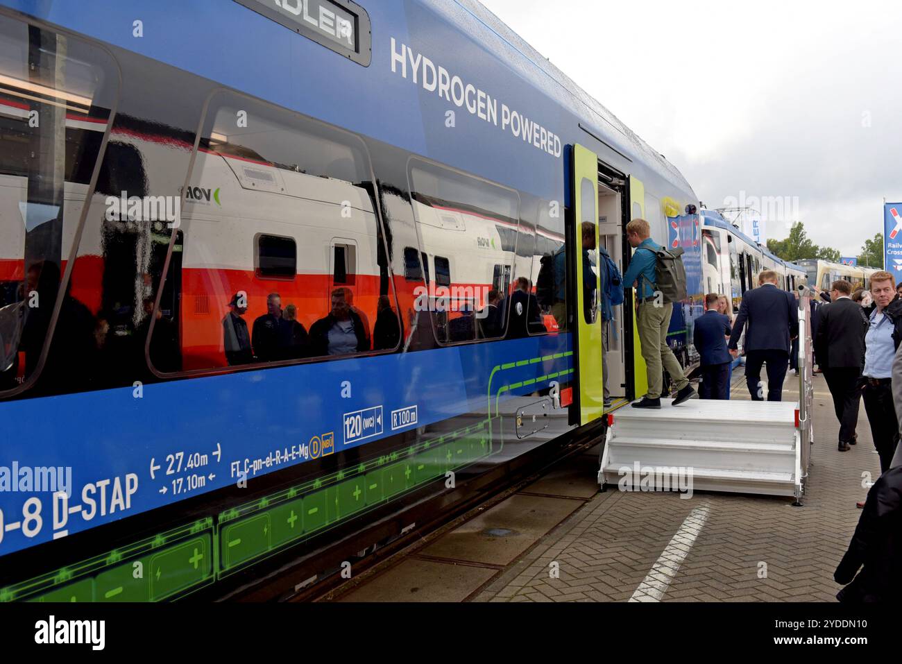 People viewing a new Stadler RS Zero hydrogen power train at the world public transport show Innotrans, Berlin, September 2024 Stock Photo