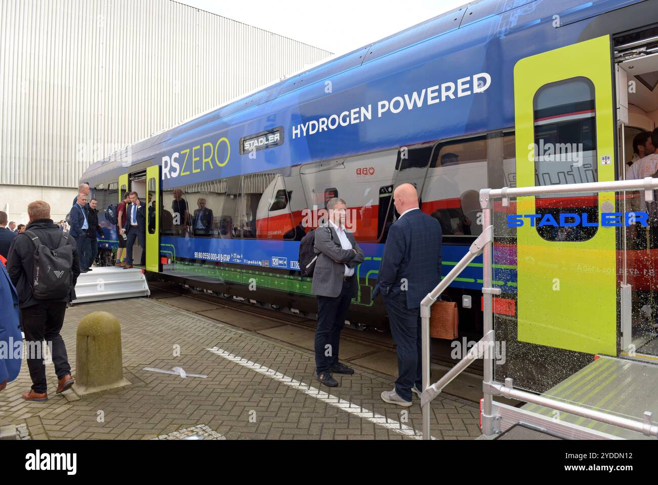 People viewing a new Stadler RS Zero hydrogen power train at the world public transport show Innotrans, Berlin, September 2024 Stock Photo