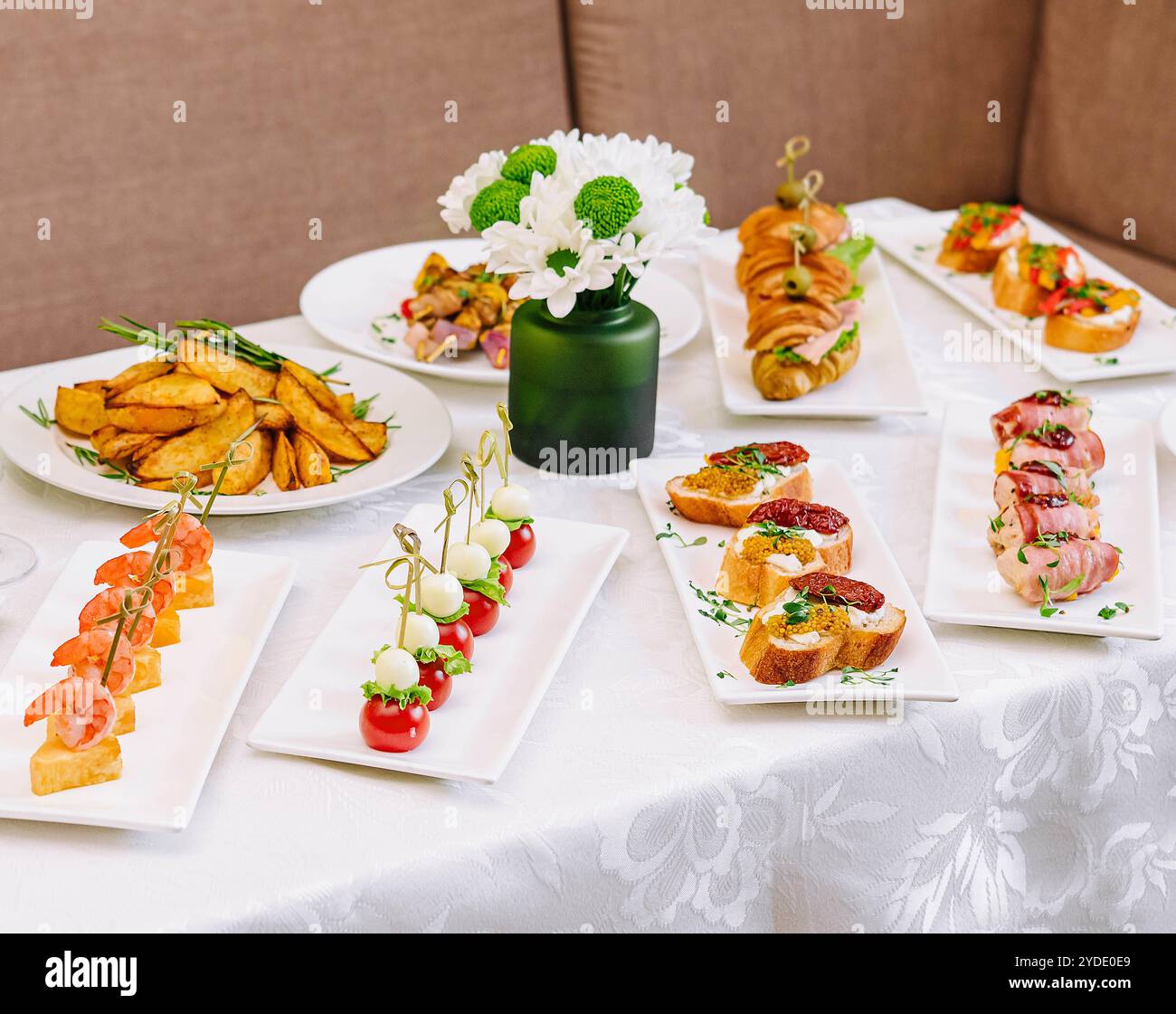 Table with different gourmet snacks top view Stock Photo