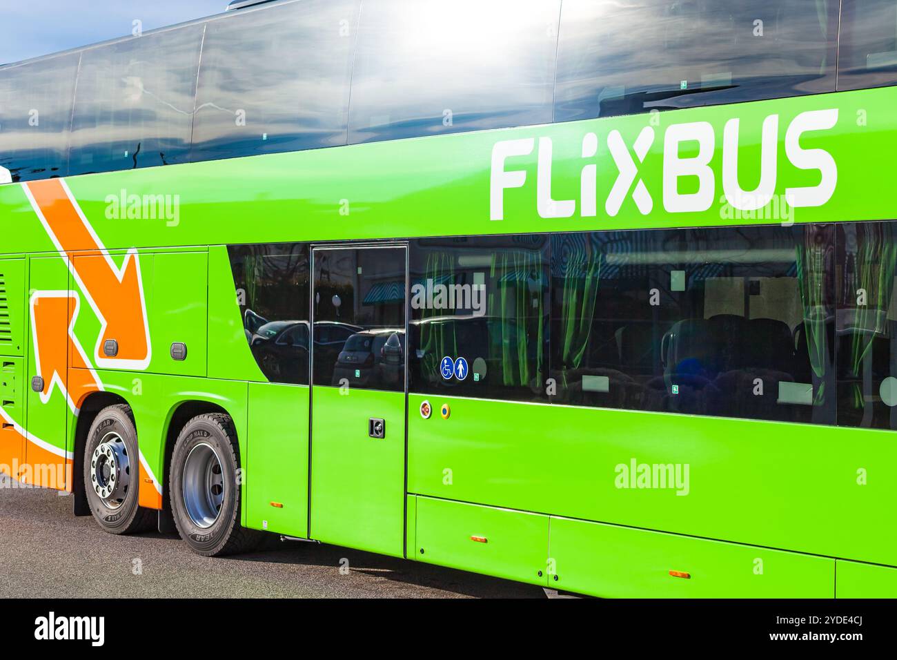 Flixbus, German brand offering intercity bus service in Europe and United States. FlixBus logo on green coach. Low cost, comfortable bus traveling. Ly Stock Photo